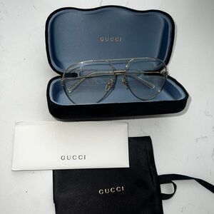 Gucci clear to dark aviator glasses